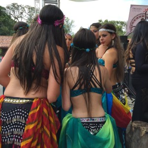 Photo of a group of Dancers backstage getting ready for their show.