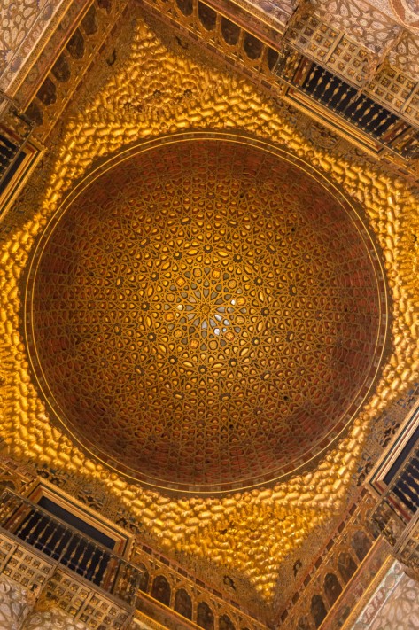 Images of a domed ceiling with gilded decorations at the Alcázar of Seville. Photo by Eduardo Libby