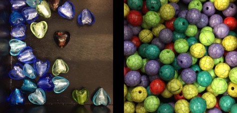 Image of heart-shaped and round colored beads. Image by Eduardo Libby