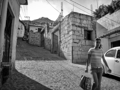 Photo of a woman on a street in Taxco. Photo by Eduardo Libby