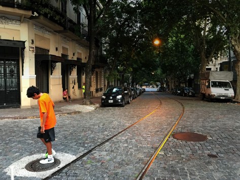 A boy taking his time on the way back home. Photo by Eduardo Libby