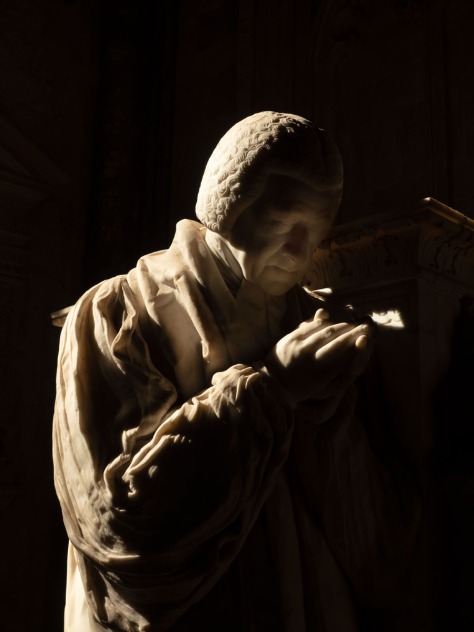 A statue inside Winchester Cathedral. Photo by Eduardo Libby