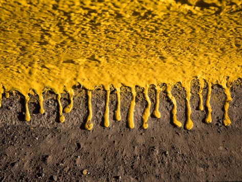 Yellow paint drops. Photo by Eduardo Libby