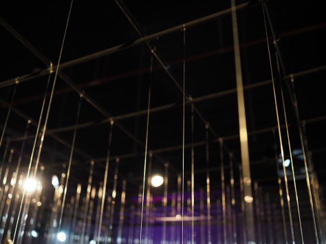 Nylon lines holding the Migrants art installation. Photo by Eduardo Libby