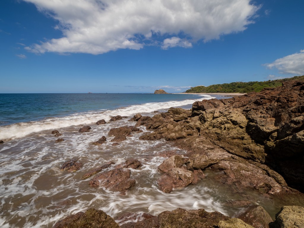 Slow shutter speed image of the rocks north of Playa Real in Guanacaste, Costa Rica. Photo by Eduardo Libby